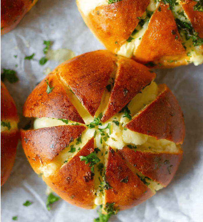 Korean cream buns split and piped with whipped cream